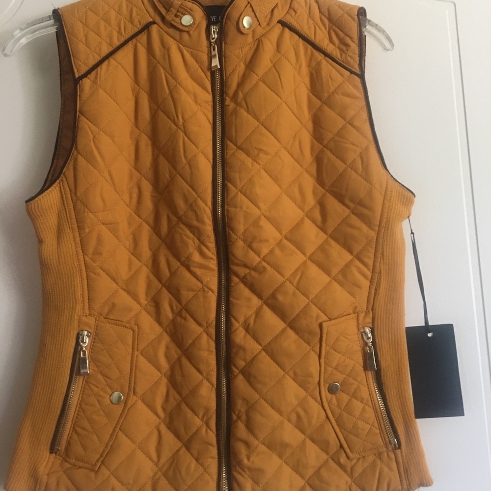 #Brand new puff vest.